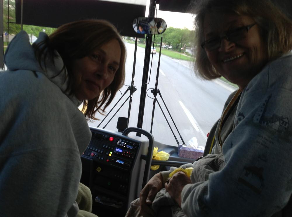 two women at the front of the bus