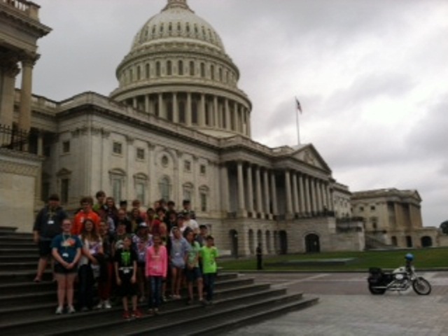 students in front of the capitol building